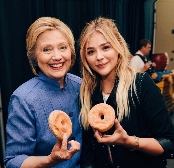 Chloe Grace Moretz standing nest to Hillary Clinton